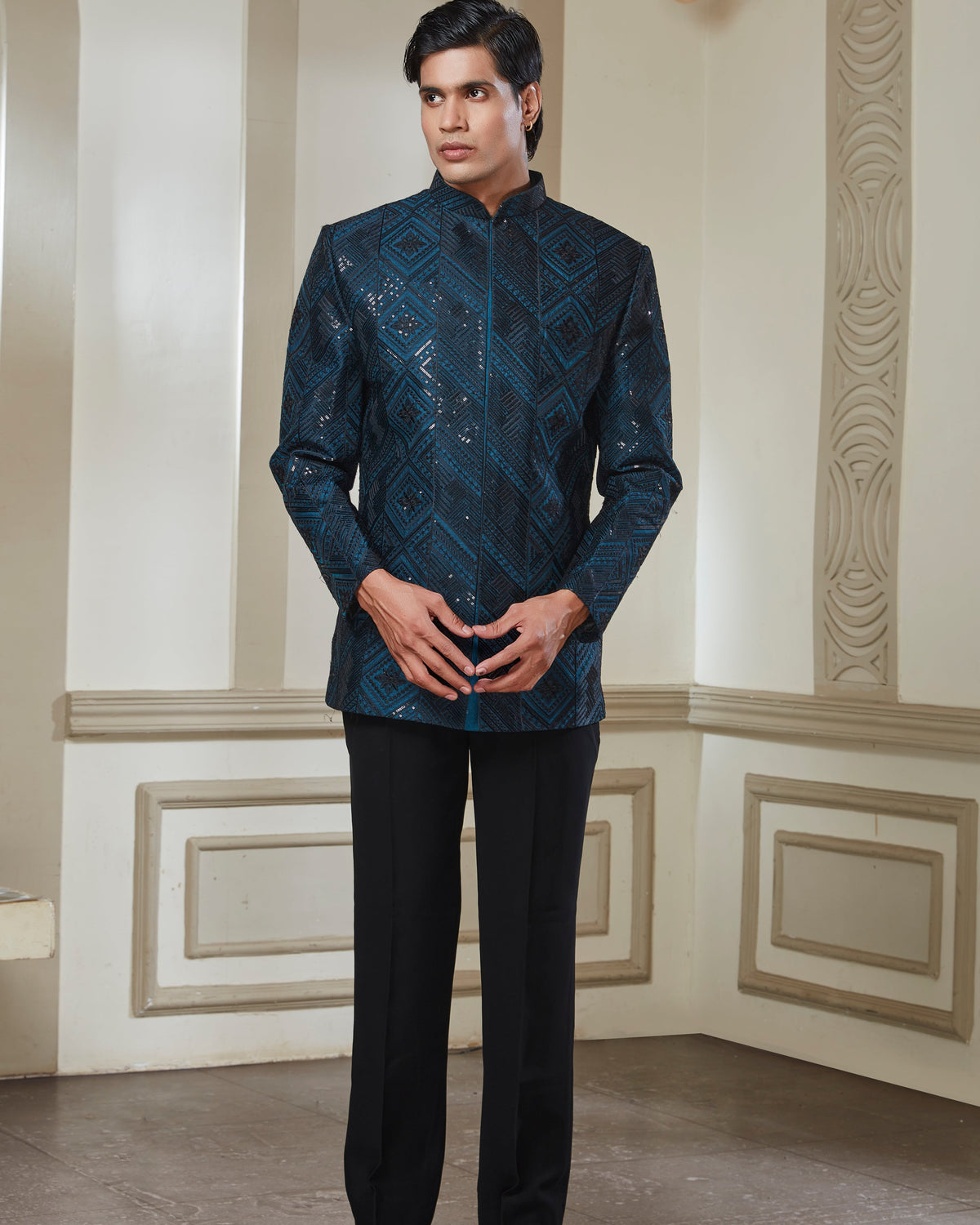 A man wearing a light blue traditional Indian suit with a mandarin collar jacket and matching trousers | Aditya Bhardwaj
